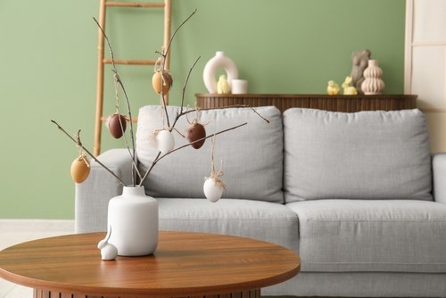 Close-up of a freshly painted room with natural light coming through a window.
